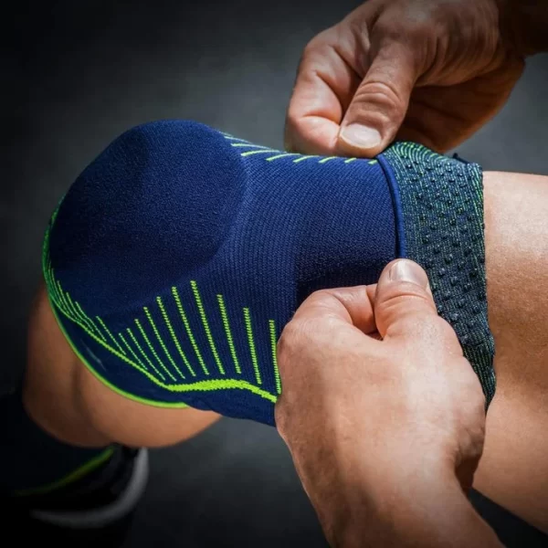 Medi Kniebandage Genumedi E+motion, Blau/grün, Mit Silikonring, Merino, Größe V 4